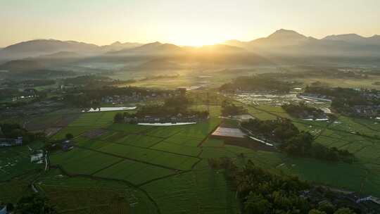 中国侨乡广东台山乡村稻田山脉山峰日出航拍