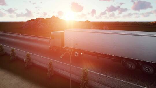 日落时在道路上行驶的拖车_3D_视频素材模板下载