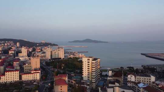 航拍山东威海沿海城市日出日落场景