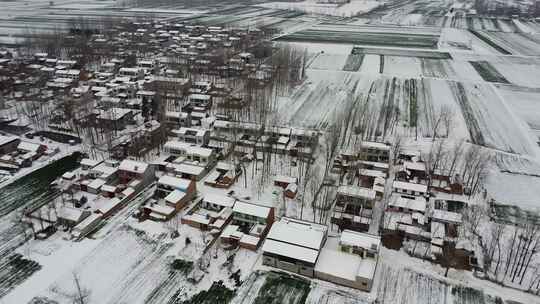 航拍冬天村庄雪景视频素材模板下载