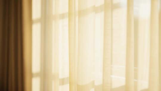 室内阳光透过窗帘光影