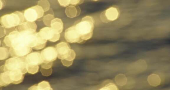 金色光斑背景素材海浪