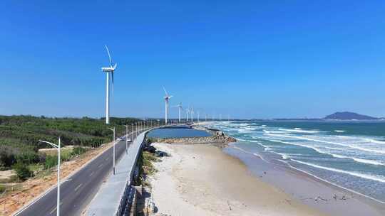 航拍福建漳州东山岛海岸线新能源风力发电