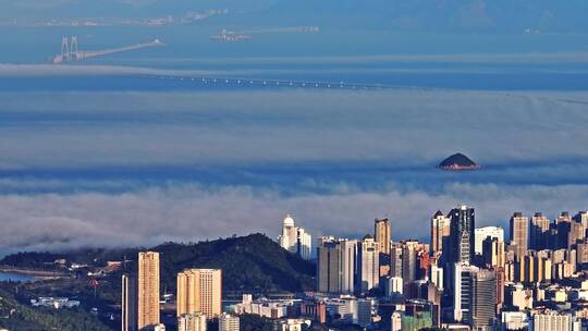 航拍仙境云海中的港珠澳大桥和珠海地标