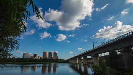 城市高铁延时 城市建筑桥梁 蓝天白云