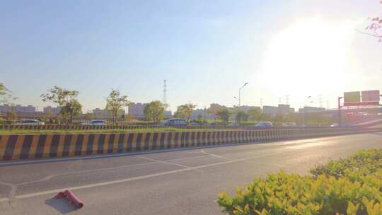 城市夕阳西下马路汽车车辆车流延时风景视频