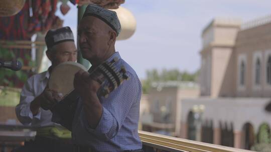 新疆喀什老城百年老茶馆表演4k视频素材模板下载