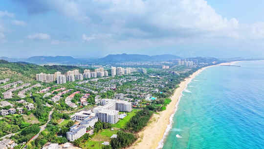 航拍蓝天白云的海南三亚市海棠湾海景酒店