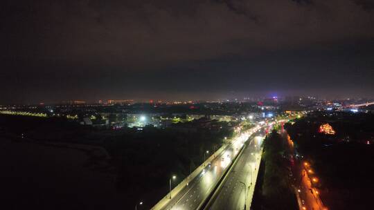 城市航拍洛阳阴雨天后城市云海夜景建筑