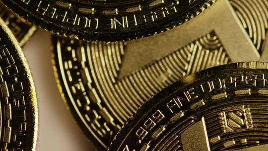 旋转的金色莫尼罗加密货币硬币视频素材模板下载