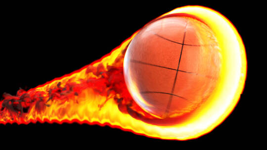 黑色背景下放飞着火的篮球