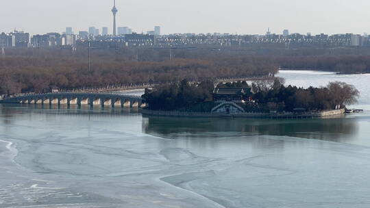 航拍俯瞰北京颐和园南湖岛及十七孔桥