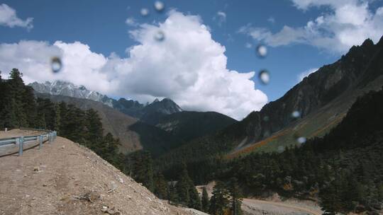 4k延时西藏大山视频丙察察蜿蜒山路光影变化