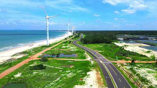 航拍海南文昌环岛旅游自驾旅行与新能源风车