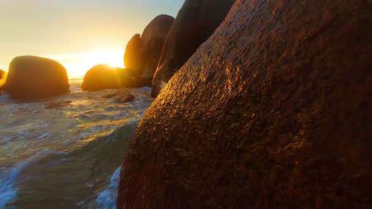 三亚海角天涯海边沙滩日落光晕