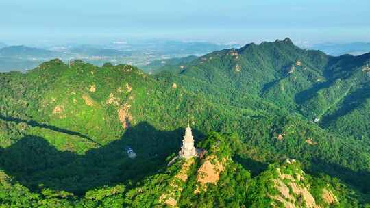 航拍千山绿色山林和大佛寺塔