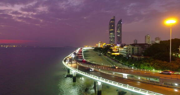 航拍夜晚海滨城市厦门海边公路风景