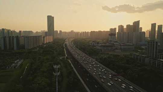 航拍杭州城市机场高架车流夕阳风光
