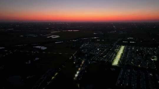 航拍夕阳落日乡村农镇道路亮化