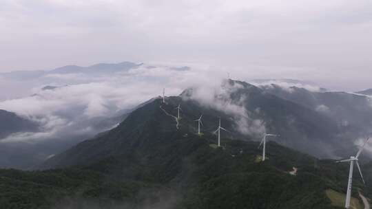 航拍罗定风车山云海大山风力发电新能源