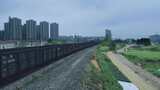 城郊铁路火车行驶景象高清在线视频素材下载
