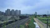 城郊铁路火车行驶景象高清在线视频素材下载