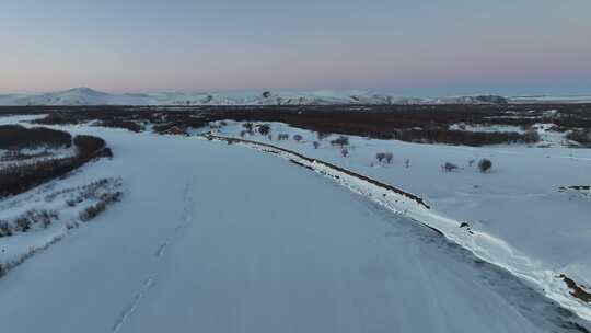 航拍大兴安岭冬季不冻河雪景视频素材模板下载