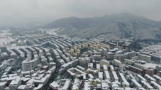 城市住宅小区冬天雪景航拍视频素材模板下载