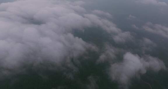 航拍早晨广东茂名信宜石镬坳云雾缭绕的山峦