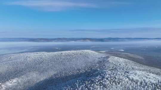 航拍林海雪原高山雾凇晨光冻雾