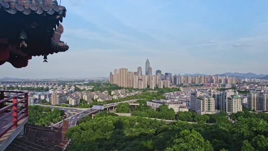 绍兴蕺山公园文笔塔与世茂天际中心建筑风光