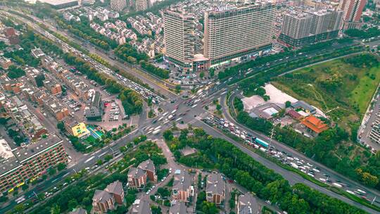 浙江义乌城市路口车流日转夜航拍延时摄影