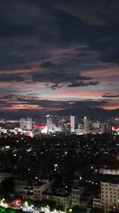 竖屏航拍城市晚霞夜景广西玉林夜景