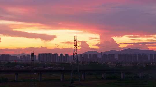 夕阳电塔城市航拍