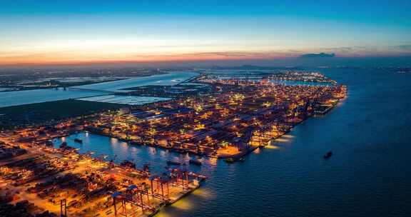4k广州南沙港货运码头集装箱日转夜航拍延时