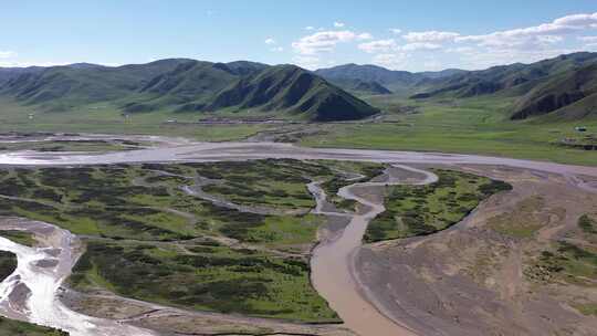 青海果洛州蓝天白云山峰河流航拍4k视频