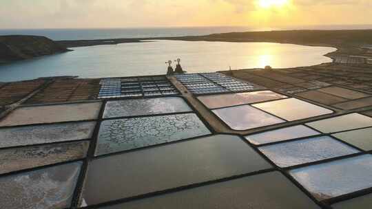 无人机航拍海边海岛海田养殖场日落蓝天白云