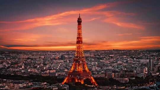 航拍法国巴黎埃菲尔铁塔日落晚霞灯光天际线视频素材模板下载