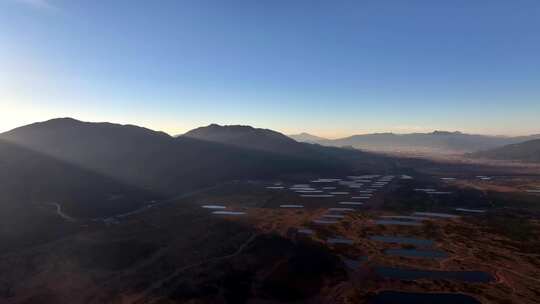 航拍高原湖泊和日出