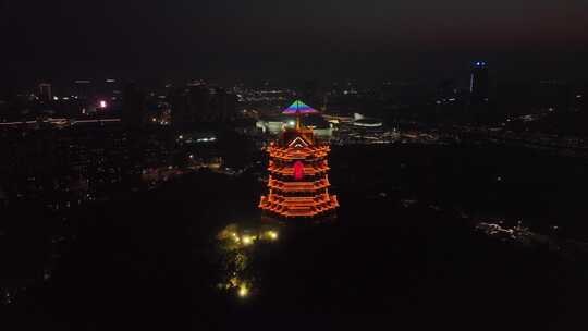 夜色中灯火辉煌的古风塔楼夜景