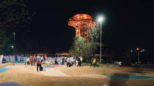 成都上新公园夜幕下的儿童乐园延时视频素材模板下载