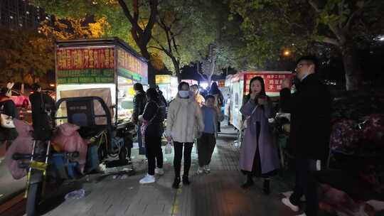 小吃一条街夜市路边摊位摆摊路边小吃视频素材模板下载