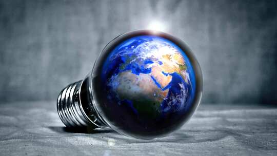 地球呈现在灯泡上面 节能环保素材