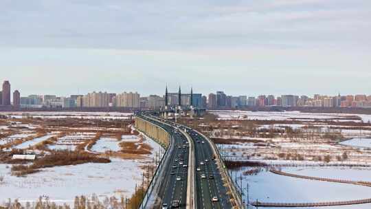 中国黑龙江哈尔滨阳明滩大桥雪景航拍