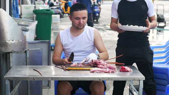 新疆人串羊肉串切羊肉2视频素材模板下载