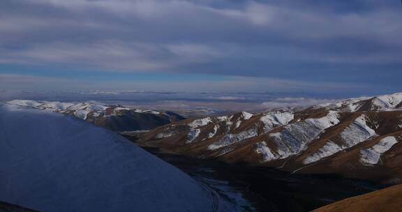 4K西藏雪山顶云海流云延时