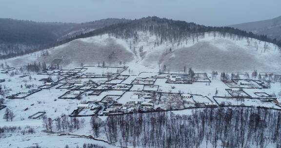 航拍大兴安岭林场山村人家雪景