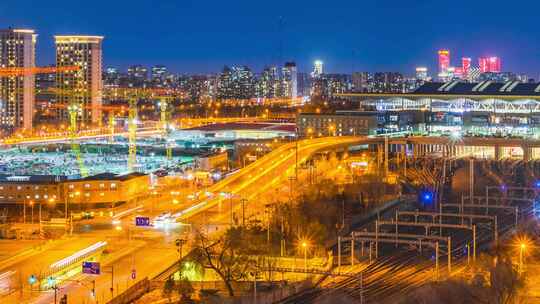 冬季北京朝阳站火车站城市夜景车流交