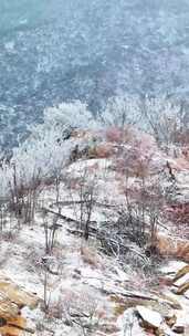 航拍威海市环翠区里口山冬季下雪山野雪景