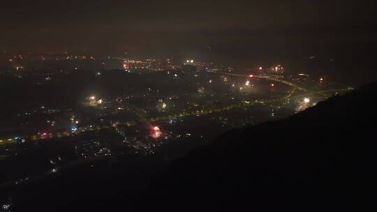 春节城市烟花燃放烟火夜晚山顶看烟花航拍